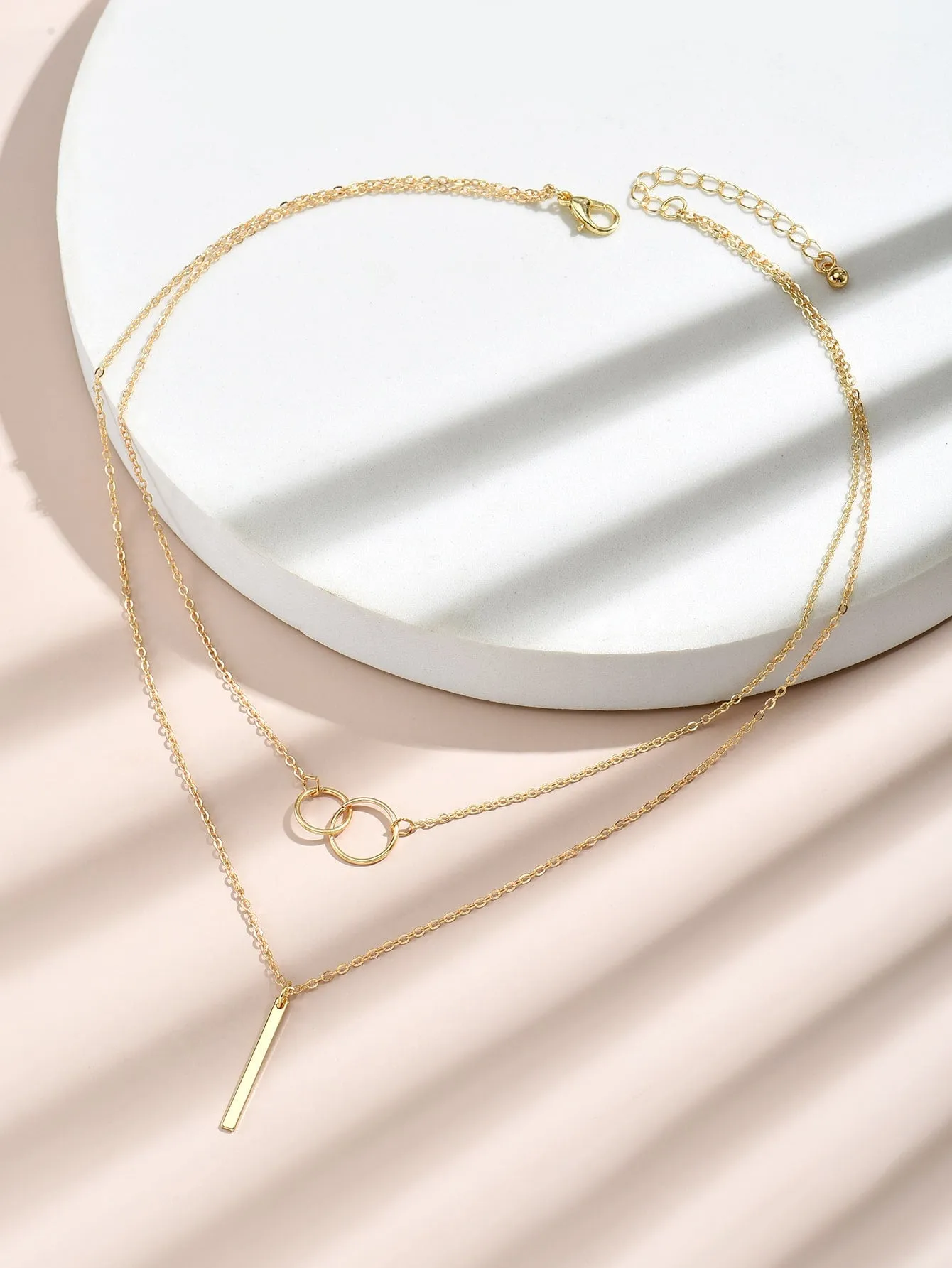GeoChic: Layered Geometric Pendant Necklace