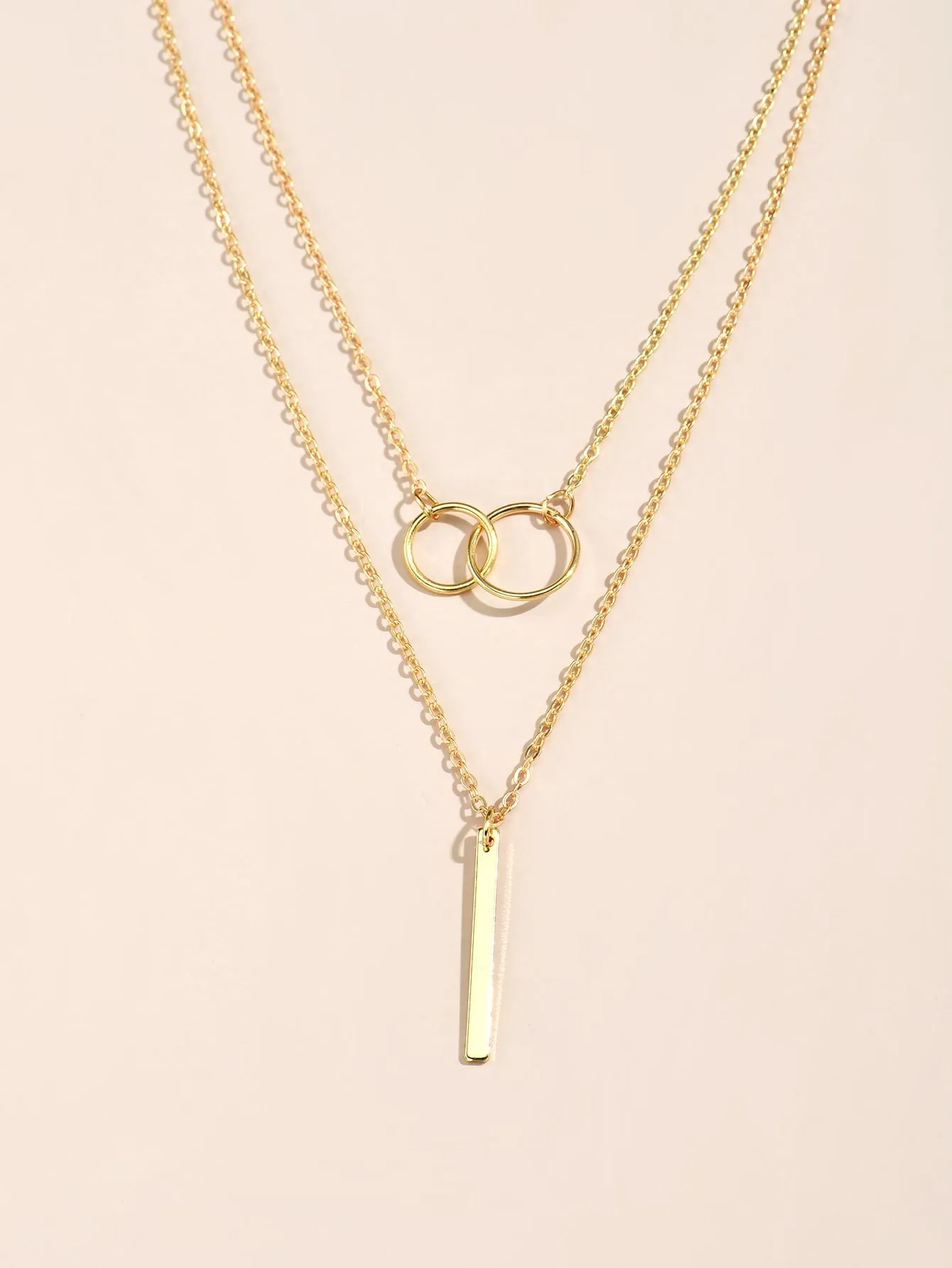 GeoChic: Layered Geometric Pendant Necklace