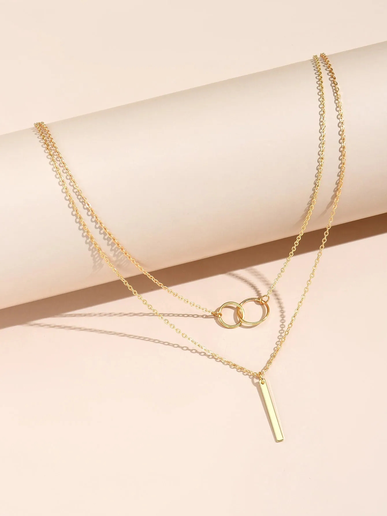 GeoChic: Layered Geometric Pendant Necklace