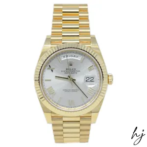 Rolex Men's Day-Date 18K Yellow Gold 40mm Silver Roman Dial Watch Reference #: 228238